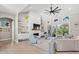 Bright living room boasts shiplap wall, built-in shelving, modern lighting, and comfortable seating at 558 Oxbow Dr., Myrtle Beach, SC 29579
