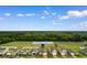 Aerial view of the property located at 572 Woodland Farms Circle, with views of green space at 572 Woodland Farms Circle, Aynor, SC 29511