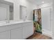 Bathroom with double sink vanity and shower at 572 Woodland Farms Circle, Aynor, SC 29511