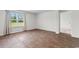 Light filled bedroom with large window and neutral carpet, offering a comfortable space at 572 Woodland Farms Circle, Aynor, SC 29511