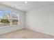 Bedroom features a window with blinds, carpet flooring and natural light at 572 Woodland Farms Circle, Aynor, SC 29511