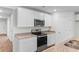 The kitchen includes stainless appliances, white cabinets, and granite counters at 572 Woodland Farms Circle, Aynor, SC 29511