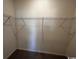Walk-in closet with shelving for optimal organization of clothing, shoes, and accessories at 594 Castillo Dr., Loris, SC 29569