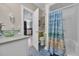 Bathroom featuring vanity with vessel sink and walk-in shower at 6001 - Mh 17A South Kings Hwy., Myrtle Beach, SC 29575