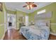 Bright bedroom with ensuite bathroom and comfortable seating at 6001 - Mh 17A South Kings Hwy., Myrtle Beach, SC 29575