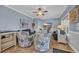 Comfortable living room with blue walls and plush seating arrangements at 6001 - Mh 17A South Kings Hwy., Myrtle Beach, SC 29575
