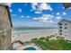 Wonderful overhead of community pool, beach and ocean, offering a great vacation lifestyle at 618 N Waccamaw Dr. # B7, Garden City Beach, SC 29576