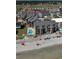 Aerial view of condo building on the beach with an outdoor swimming pool and multiple balconies at 618 N Waccamaw Dr. # B7, Garden City Beach, SC 29576