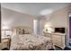 Inviting bedroom with a nautical themed bedspread and a dresser at 618 N Waccamaw Dr. # B7, Garden City Beach, SC 29576