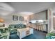 Comfortable living space adjacent to a breakfast bar with seating, perfect for entertaining at 618 N Waccamaw Dr. # B7, Garden City Beach, SC 29576