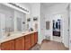 Bathroom features double sinks, tile floors, and entry to a walk-in closet and a shower at 637 Botany Loop # 64, Murrells Inlet, SC 29576