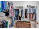Walk-in closet with hanging racks and shelves for ample storage and a wooden storage chest at 637 Botany Loop # 64, Murrells Inlet, SC 29576