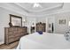 Spacious main bedroom with hardwood floors, trey ceiling, and ensuite bath with a walk-in closet at 637 Botany Loop # 64, Murrells Inlet, SC 29576