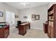 Well-lit office space boasts a ceiling fan, built-in shelving and a spacious desk area at 637 Botany Loop # 64, Murrells Inlet, SC 29576