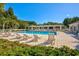 A tranquil pool area with comfortable lounge chairs, ideal for sunny days at 637 Botany Loop # 64, Murrells Inlet, SC 29576