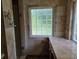 Well-lit bathroom with beautiful tile countertops and a window letting in natural light at 6542 Wellington Dr., Murrells Inlet, SC 29576