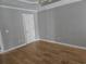 Bright bedroom with hardwood floors, crown molding, and neutral paint for a calm atmosphere at 6542 Wellington Dr., Murrells Inlet, SC 29576