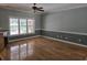 Bright living room boasts hardwood floors and a large window allowing for natural light at 6542 Wellington Dr., Murrells Inlet, SC 29576