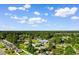 An aerial view shows lush trees surrounding 704 Bonnie Dr. in the neighborhood at 704 Bonnie Dr., Myrtle Beach, SC 29588