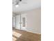 Bedroom with wood floors and white trim with a mirrored closet at 704 Bonnie Dr., Myrtle Beach, SC 29588
