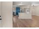 A contemporary kitchen design featuring stylish blue cabinets, white countertops, and stainless steel appliances at 704 Bonnie Dr., Myrtle Beach, SC 29588