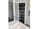 Open pantry with ample shelving, conveniently located off the kitchen at 71 Mohican Dr., Georgetown, SC 29440