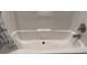 Close-up of a standard bathtub with shower head and curtain rod at 71 Mohican Dr., Georgetown, SC 29440