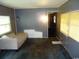 View of living room with blue wood paneled walls and a sofa couch at 742 Se Hebron Dr., Conway, SC 29527
