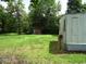 View of the home and surrounding yard with storage shed on property at 742 Se Hebron Dr., Conway, SC 29527