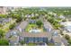 Aerial view showcasing a residential complex with a swimming pool, landscaping, and easy parking at 7700 Porcher Dr. # 3205, Myrtle Beach, SC 29572