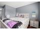 Comfortable bedroom featuring wood floors, a bright colored pillows and décor at 7700 Porcher Dr. # 3205, Myrtle Beach, SC 29572