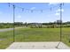 Spacious backyard with an outdoor patio and string lights, great for entertaining and relaxation at 798 Woodland Farms Circle, Aynor, SC 29511