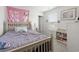 Bright bedroom with light-colored furniture and neutral carpet flooring at 798 Woodland Farms Circle, Aynor, SC 29511