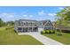Aerial view of a well-manicured home with a lush green lawn and long driveway at 8016 Old Reaves Ferry Rd., Conway, SC 29526