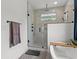 Modern bathroom featuring glass shower, tub, and matte black fixtures at 8016 Old Reaves Ferry Rd., Conway, SC 29526