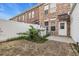 Quaint brick-paved backyard with white privacy fence perfect for outdoor living at 945 Rosencrans Ln. # B, Myrtle Beach, SC 29577