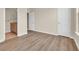 Bedroom with hardwood floors and access to ensuite bathroom with single sink vanity at 945 Rosencrans Ln. # B, Myrtle Beach, SC 29577
