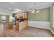 Open kitchen with stainless steel appliances, granite countertops, and wood cabinetry at 945 Rosencrans Ln. # B, Myrtle Beach, SC 29577