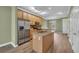 Kitchen with stainless steel appliances, granite counters, and an open layout at 945 Rosencrans Ln. # B, Myrtle Beach, SC 29577