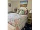 Bright bedroom featuring a cozy bed with decorative pillows and coastal decor at 9501 Shore Dr. # 323, Myrtle Beach, SC 29572