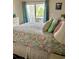 Bedroom features a view of the outdoors through sliding glass doors at 9501 Shore Dr. # 323, Myrtle Beach, SC 29572