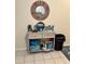 Entryway features a console table with decorative mirror and coastal-themed decor at 9501 Shore Dr. # 323, Myrtle Beach, SC 29572