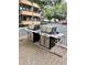 Grilling area featuring two stainless steel grills on a wooden deck, perfect for outdoor cooking and gatherings at 9501 Shore Dr. # 323, Myrtle Beach, SC 29572