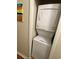 Laundry room showcases a stackable washer and dryer unit at 9501 Shore Dr. # 323, Myrtle Beach, SC 29572