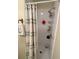 Bathroom features a tiled shower with updated shower head and shower caddy at 9501 Shore Dr. # 323, Myrtle Beach, SC 29572