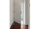Open doorway leading to the home's interior with dark wood and tile flooring at 964 Great Egret Circle Sw # B, Sunset Beach, NC 28468