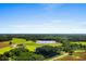 An aerial view showcases approximate lot lines and the lush greenery surrounding the property at Lot 1-A Fairlane Rd., Loris, SC 29569