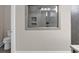 Shower in bathroom with neutral tiled accent and glass window at 1004 Fowler Rd., Conway, SC 29526