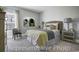 Bright bedroom featuring neutral walls, a wicker headboard, and soft, textured bedding, creating a cozy and inviting atmosphere at 1004 Fowler Rd., Conway, SC 29526