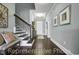 Staircase and Entryway featuring hardwood floors and trim, with neutral paint at 1004 Fowler Rd., Conway, SC 29526